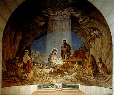 يسوع { الإله كما يعتقد النصارى } موضوع في المذود. {الإناء الذي يأكل فيه البهائم }  ويلتف حوله مجموعة من الحيوانات